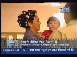 madhuri as a beautiful housewife in curlers and with her son aryan )))